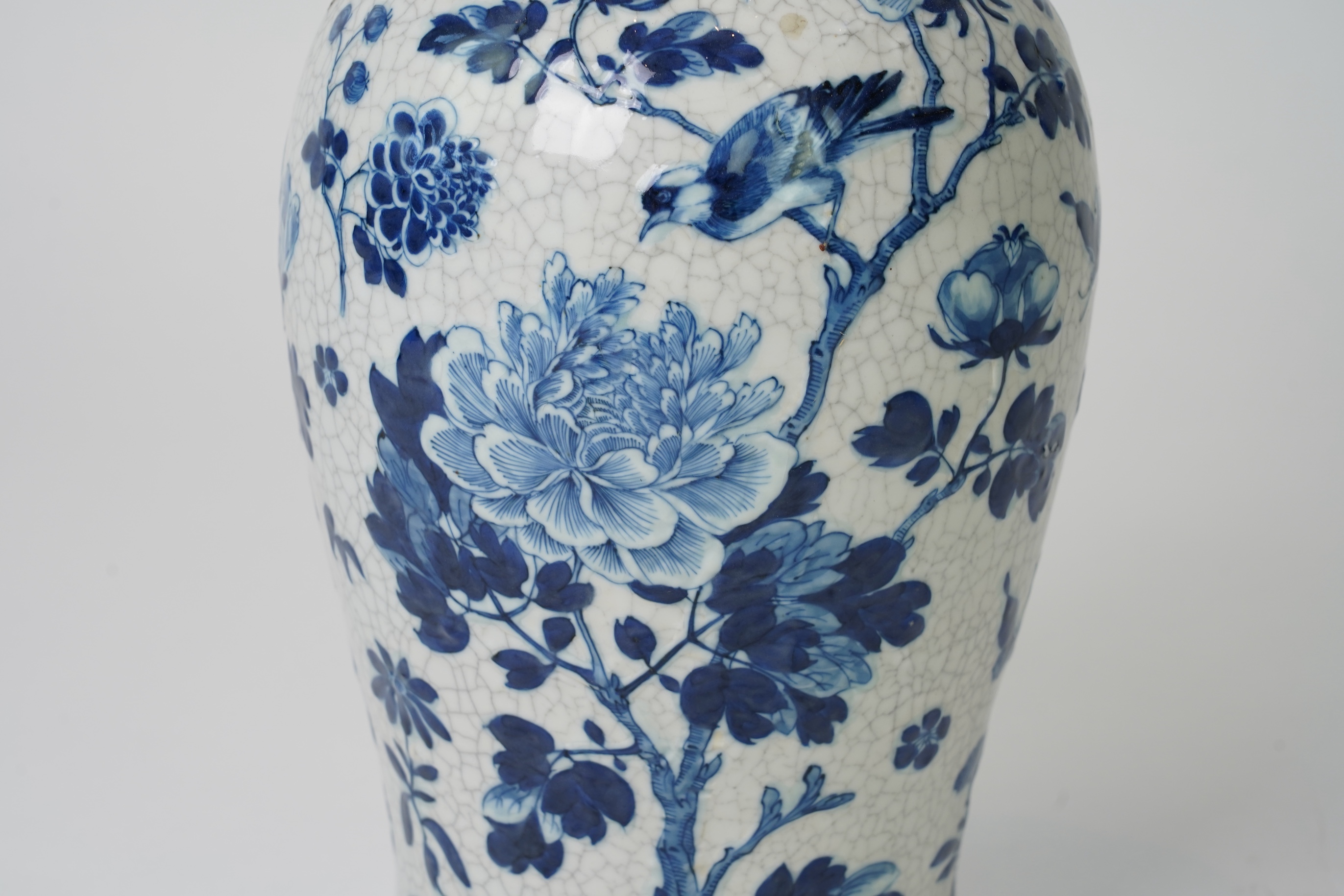 A Chinese blue and white crackle glaze baluster vase and cover, early 20th century